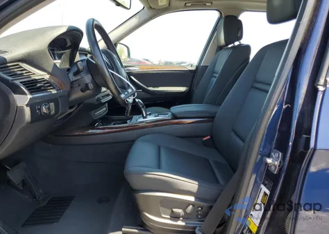 2011 BMW X5 xDrive35I z USA, uszkodzony, nr VIN 5UXZV4C5XBL412028